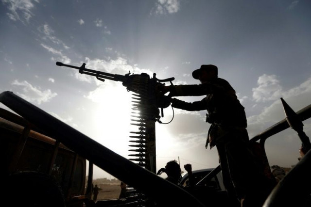 a rebel stands on a vehicle mounted with a machine gun photo afp a rebel stands on a vehicle mounted with a machine gun photo afp
