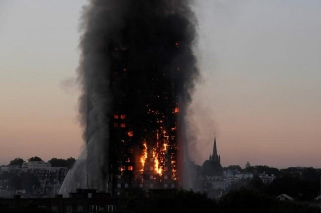 flames and smoke billow as firefighters deal with a serious fire in the grenfell tower apartment block at latimer road in west london photo reuters flames and smoke billow as firefighters deal with a serious fire in the grenfell tower apartment block at latimer road in west london photo reuters