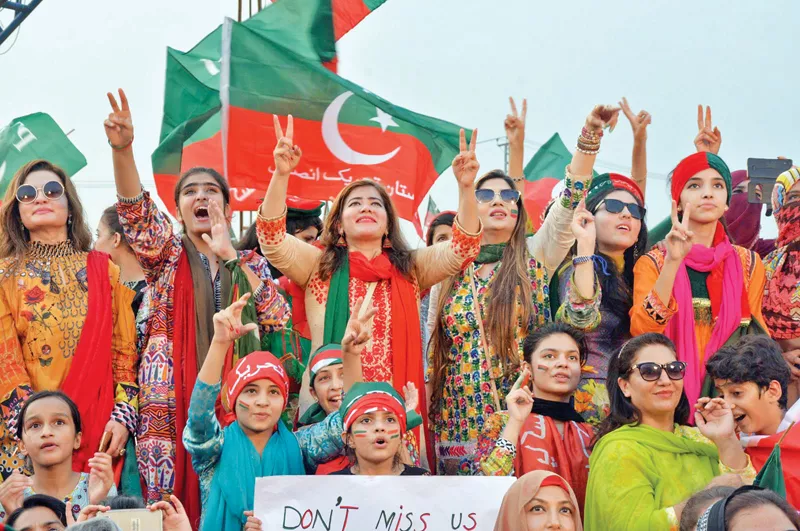 a pti supporter from north waziristan mastan khan in decorated jeep while women supporters cheer for imran khan photos agencies a pti supporter from north waziristan mastan khan in decorated jeep while women supporters cheer for imran khan photos agencies