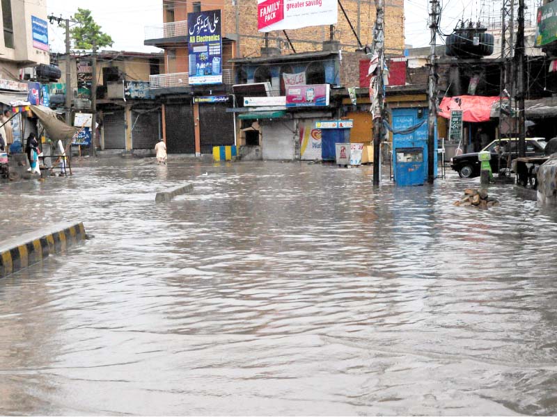 many localities of rawalpindi were flooded after morning showers photo express agencies