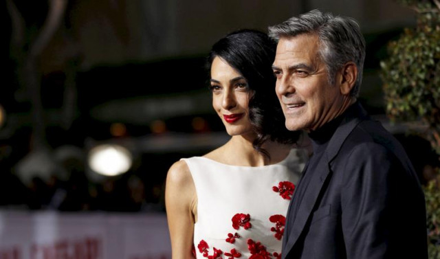 george clooney and his wife amal pose at the premiere of quot hail caesar quot in los angeles california photo reuters george clooney and his wife amal pose at the premiere of quot hail caesar quot in los angeles california photo reuters