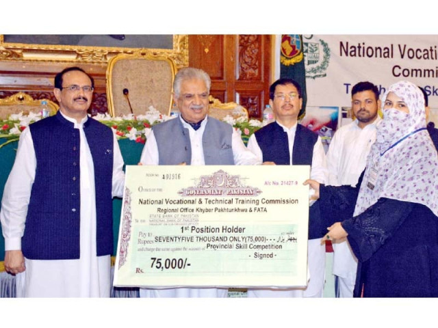 k p governor engr iqbal zafar jhagra awards a cheque to 1st position holder at navttc skills competition at governor s house photo inp k p governor engr iqbal zafar jhagra awards a cheque to 1st position holder at navttc skills competition at governor s house photo inp