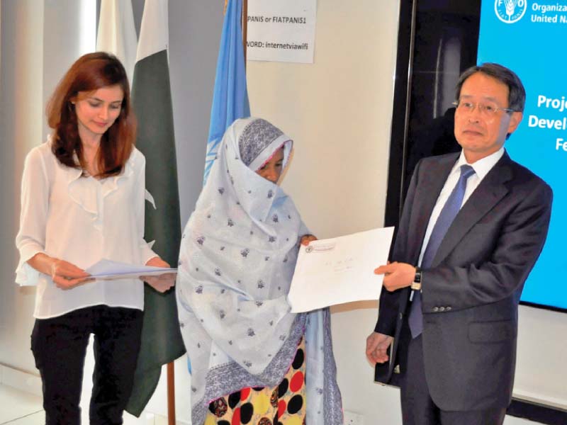 japanese ambassador takashi kurai gives a certificate to a farmer trainee photo express