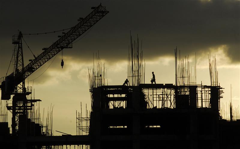 labourers work at a construction site photo reuters