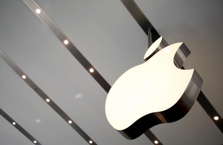 the apple logo is pictured inside the newly opened omotesando apple store at a shopping district in tokyo photo reuters