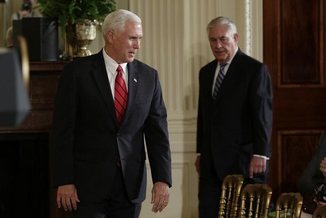 u s vice president mike pence l arrives with secretary of state rex tillerson r to attend a joint press conference held by u s president donald trump and colombian president juan manuel santos at the white house in washington u s may 18 2017 photo reuters