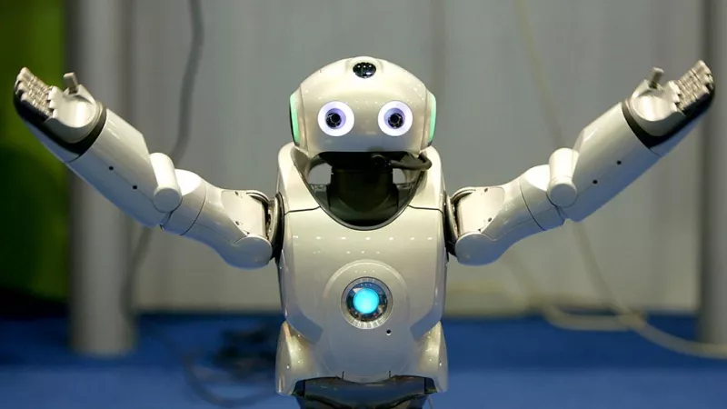 a robot spreads its arms photo reuters a robot spreads its arms photo reuters