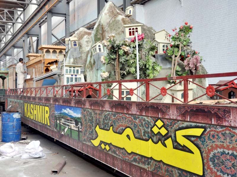 workers busy in giving final touches to special azadi train photo zafar aslam express