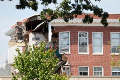 damage to the building is seen as emergency personnel work the scene of school building collapse at minnehaha academy in minneapolis minnesota us photo reuters