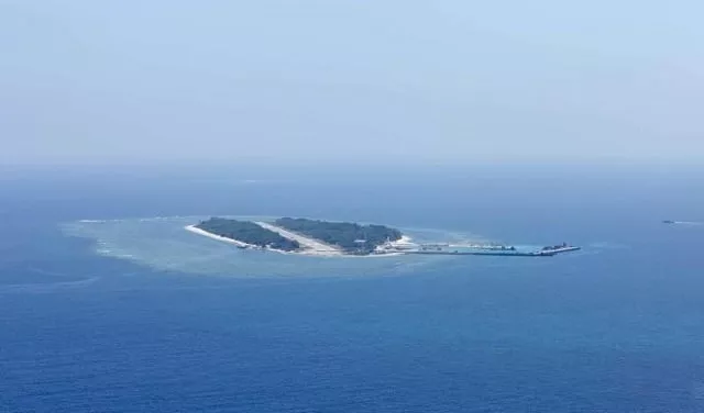 an aerial photo taken though a glass window of a taiwanese military plane shows the view of itu aba which the taiwanese call taiping at the south china sea march 23 2016 photo reuters an aerial photo taken though a glass window of a taiwanese military plane shows the view of itu aba which the taiwanese call taiping at the south china sea march 23 2016 photo reuters