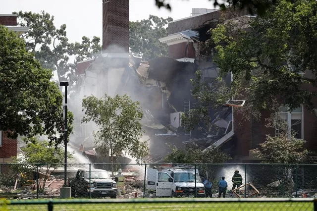 the blast pushed part of the building 039 s wall outwards causing the roof to collapse and pancaking two floors into rubble according to fire chief john fruetel photo reuters the blast pushed part of the building 039 s wall outwards causing the roof to collapse and pancaking two floors into rubble according to fire chief john fruetel photo reuters