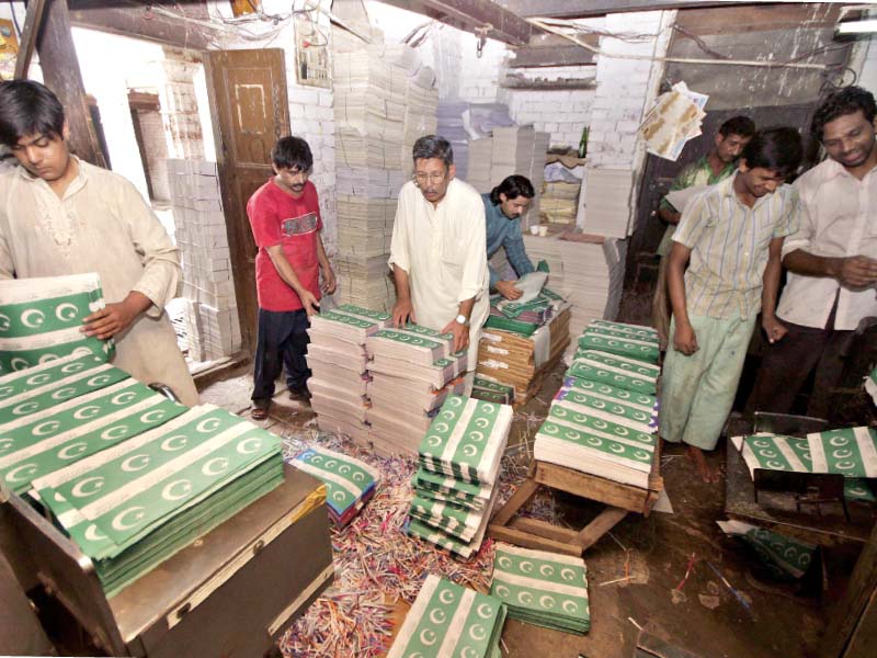 markets have been flooded with pakistani flags buntings badges and other related stuff ahead of the independence day photo abid nawaz express