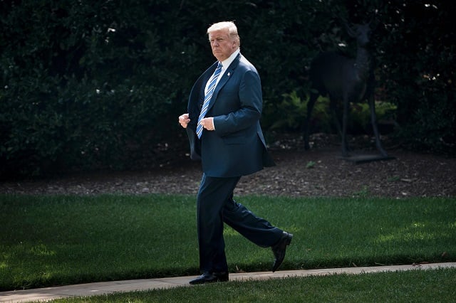 us president donald trump walks to marine one on the south lawn of the white house august 3 2017 in washington dc the president is traveling to huntington west virginia for a rally special counsel robert mueller has impaneled a grand jury to investigate russia 039 s interference with the 2016 presidential election the wall street journal reported on august 3 photo afp