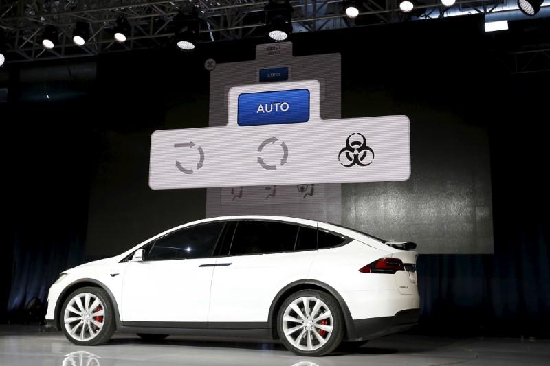 a tesla model x electric sports utility vehicle is displayed during a presentation in fremont california september 29 2015 photo reuters