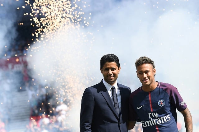 paris saint germain 039 s brazilian forward neymar r poses with paris saint germain 039 s psg qatari president nasser al khelaifi l during his presentation to the fans at the parc des princes stadium in paris on august 5 2017 brazil superstar neymar will watch from the stands as paris saint germain open their season on august 5 2017 but the french club have already clawed back around a million euros on their world record investment neymar who signed from barcelona for a mind boggling 222 million euros 264 million is presented to the psg support prior to his new team 039 s first game of the ligue 1 campaign against promoted amiens photo afp