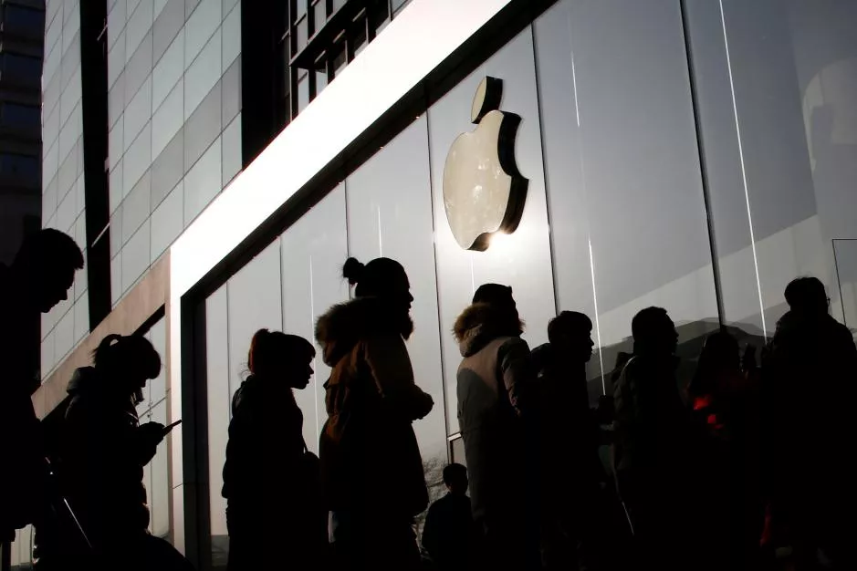 file photo people line up at an apple store shortly before it opens in beijing china january 3 2017 photo reuters file photo people line up at an apple store shortly before it opens in beijing china january 3 2017 photo reuters