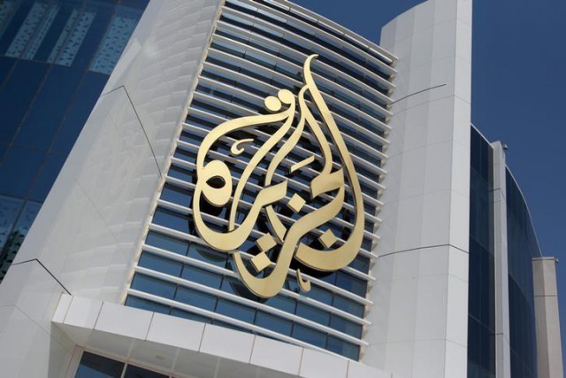 the logo of al jazeera media network is seen on its headquarters building in doha qatar june 8 2017 photo reuters the logo of al jazeera media network is seen on its headquarters building in doha qatar june 8 2017 photo reuters