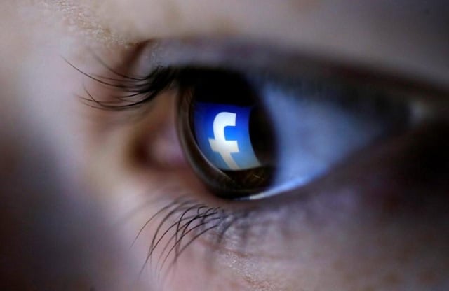 a picture illustration shows a facebook logo reflected in a person 039 s eye in zenica march 13 2015 photo reuters ruvic illustration file photo