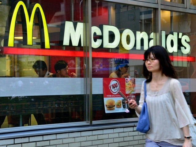 fast food giant will add 2 000 stores to its current 2 500 and aim for double digit sales growth in next five years photo afp