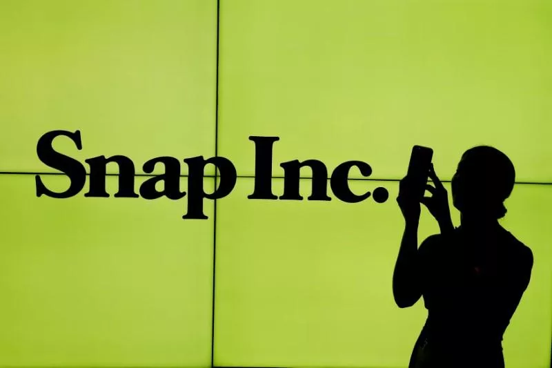 file photo a woman stands in front of the logo of snap inc on the floor of the new york stock exchange nyse while waiting for snap inc to post their ipo in new york city new york u s on march 2 2017 photo reuters file photo a woman stands in front of the logo of snap inc on the floor of the new york stock exchange nyse while waiting for snap inc to post their ipo in new york city new york u s on march 2 2017 photo reuters
