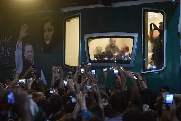 ousted pakistani prime minister nawaz sharif addresses a rally from his bullet proof container in rawalpindi on august 9 2017 deposed pakistani prime minister nawaz sharif is leading a rally from the capital islamabad to his home in lahore following his ouster by the supreme court following a corruption probe photo afp ousted pakistani prime minister nawaz sharif addresses a rally from his bullet proof container in rawalpindi on august 9 2017 deposed pakistani prime minister nawaz sharif is leading a rally from the capital islamabad to his home in lahore following his ouster by the supreme court following a corruption probe photo afp