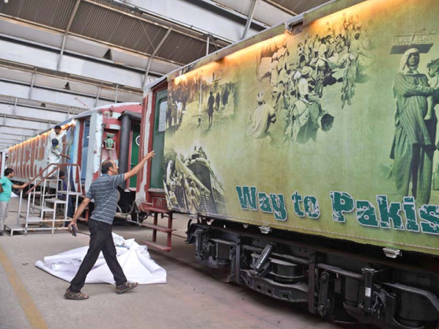 pakistan railways employees walk past azadi train photo afp pakistan railways employees walk past azadi train photo afp