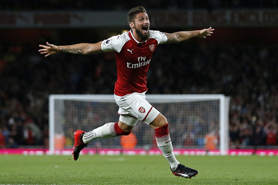 arsenal 039 s french striker olivier giroud celebrates scoring arsenal 039 s fourth goal during the english premier league football match between arsenal and leicester city at the emirates stadium in london on august 11 2017 photo afp