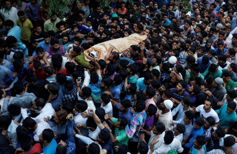 a funeral procession is in progress in occupied kashmir photo reuters file