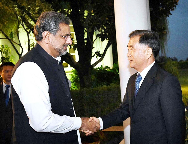 pm abbasi receives chinese vice premier wang yang upon his arrival at the pm house photo app