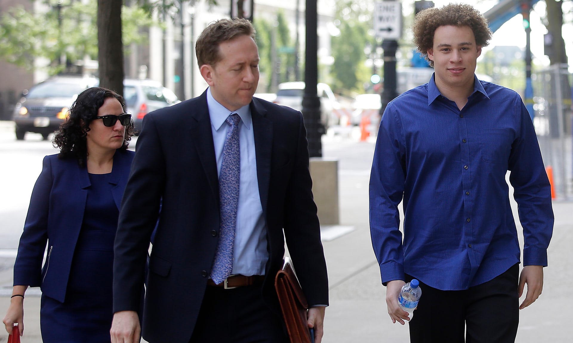 23 year old marcus hutchins r has been accused of creating malware to attack the banking system photo afp