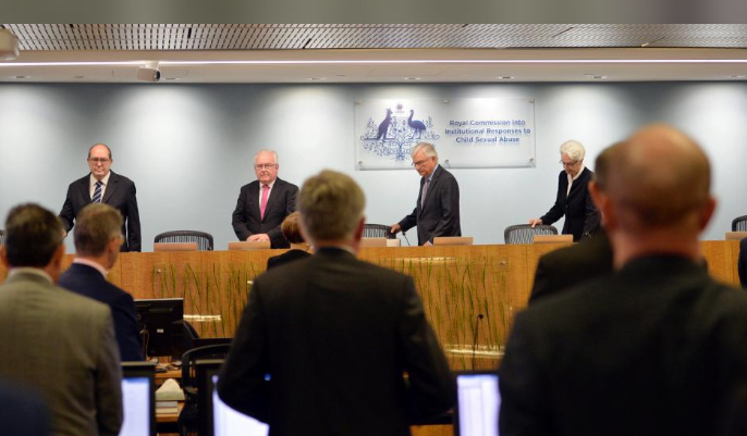officials from the royal commission into institutional responses to child sexual abuse arrive on the opening day of their public hearing photo reuters