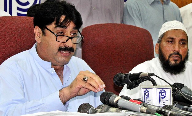 former k po minister ziaullah afridi addresses a press conference at the peshawar press club on tuesday august 15 2017 photo inp