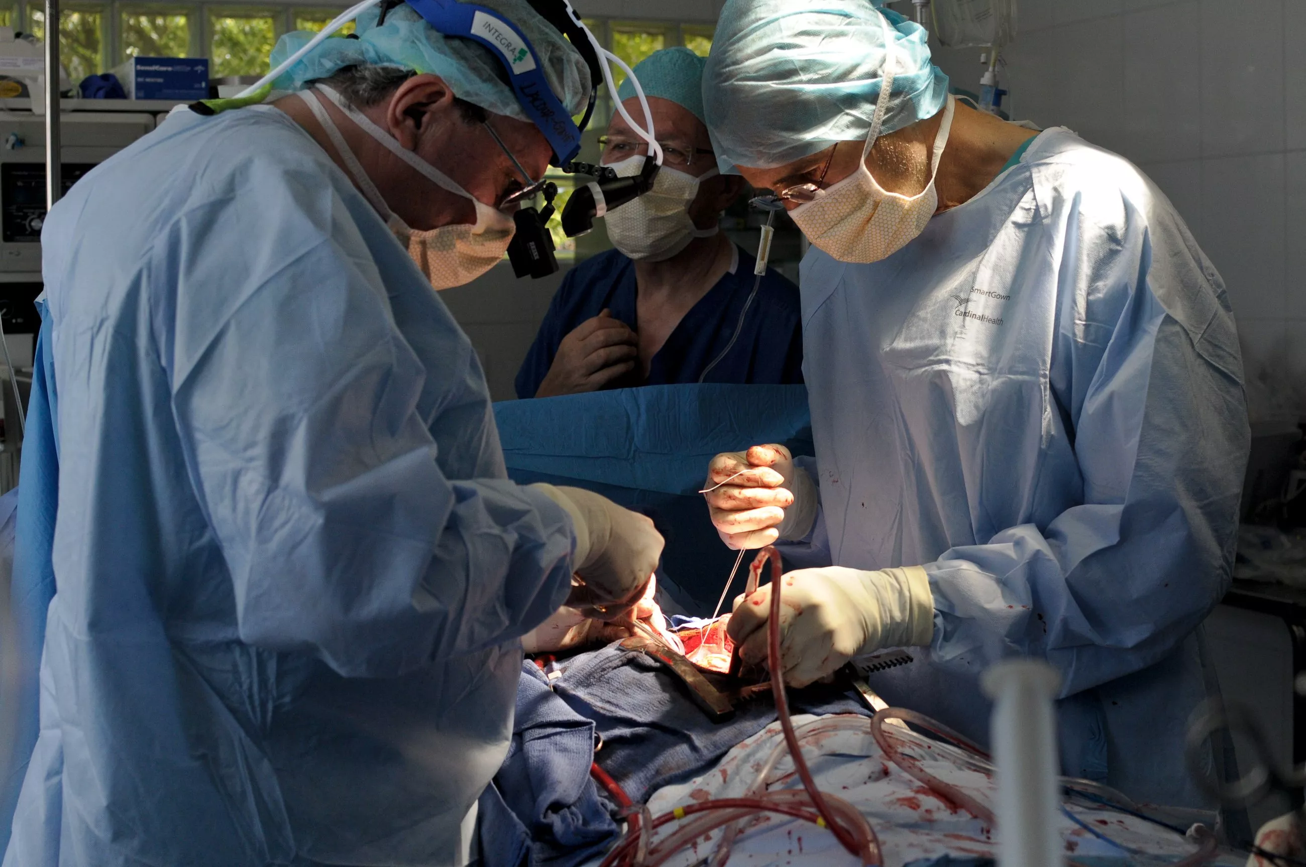 surgeons perform surgery to close the hole between the heart chambers of a patient photo reuters surgeons perform surgery to close the hole between the heart chambers of a patient photo reuters