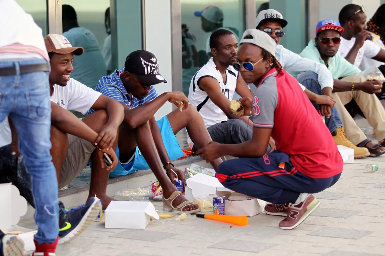 migrants workers have food during a celebratory event before the final soccer match between taleb group and gulf contracting at qatar workers cup in doha qatar may 6 2016 photo reuters migrants workers have food during a celebratory event before the final soccer match between taleb group and gulf contracting at qatar workers cup in doha qatar may 6 2016 photo reuters