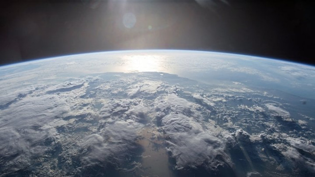 the sun s light reflected off a body of water as the international space station orbits earth photo afp nasa the sun s light reflected off a body of water as the international space station orbits earth photo afp nasa