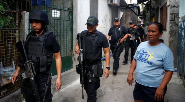 police also shot dead 32 drug suspects in what was billed as a quot shock and awe quot operation against drug traffickers photo reuters