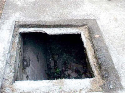 minor succumbs to open manhole