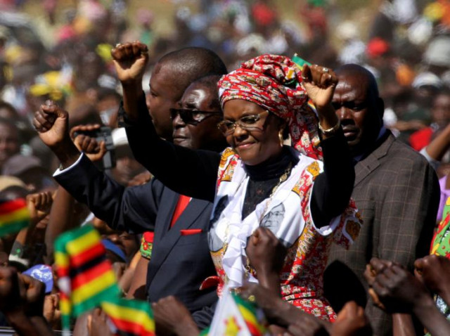 president robert mugabe and his wife grace greet supporters of his zanu pf party during a rally in harare zimbabwe photo reuters president robert mugabe and his wife grace greet supporters of his zanu pf party during a rally in harare zimbabwe photo reuters