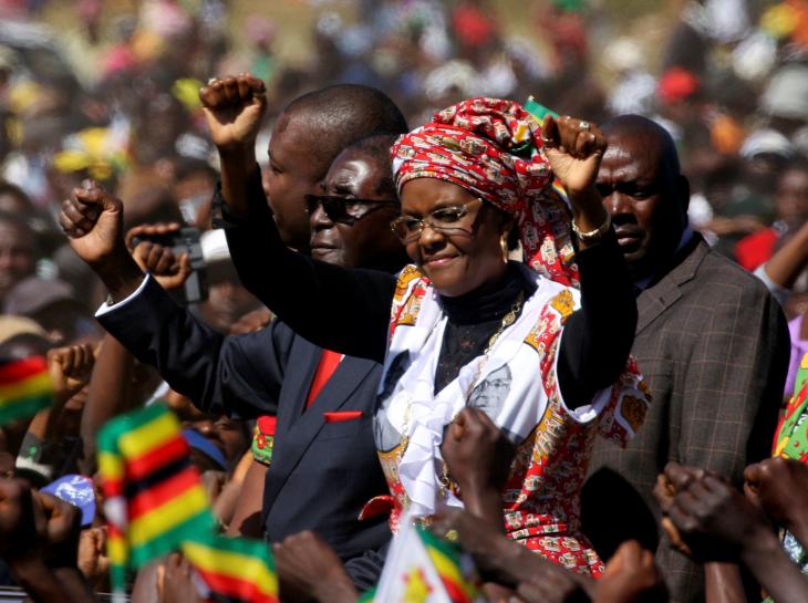 president robert mugabe and his wife grace greet supporters of his zanu pf party during a rally in harare zimbabwe photo reuters