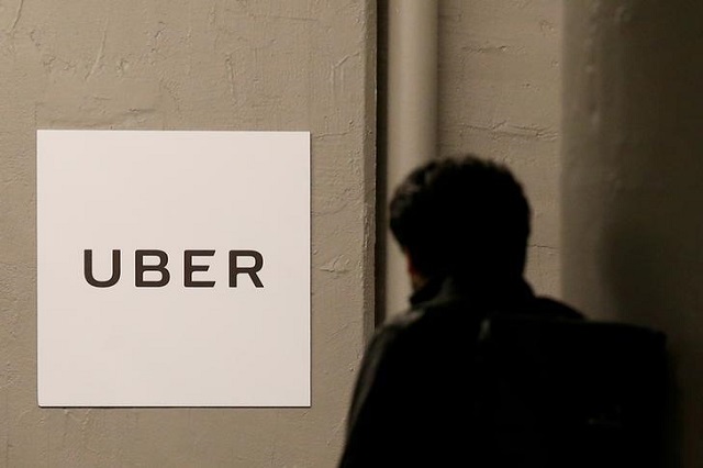 file photo   a man arrives at the uber offices in queens new york u s february 2 2017 photo reuters