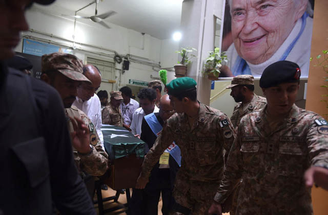 pakistani army personnel and members of the marie adelaide leprosy centre transport the coffin of ruth pfau photo afp