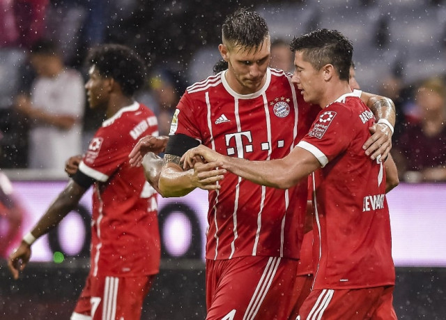 landmark moment the video assistant referee is being trialled in the bundesliga this season and came into play for the first time to spot that lewandowski was fouled in the area in the second half photo afp landmark moment the video assistant referee is being trialled in the bundesliga this season and came into play for the first time to spot that lewandowski was fouled in the area in the second half photo afp