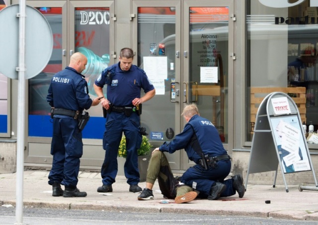 police shot and wounded the knife wielding suspect on friday photo afp