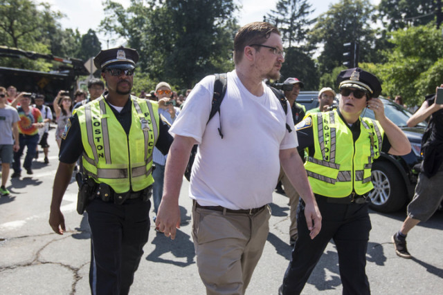 a participant of the quot free speech rally quot center is escorted to a waiting police cruiser after the rally was ended on boston common on august 19 2017 in boston massachusetts thousands of demonstrators and counter protestors are expected at boston common where the boston free speech rally is being held photo afp a participant of the quot free speech rally quot center is escorted to a waiting police cruiser after the rally was ended on boston common on august 19 2017 in boston massachusetts thousands of demonstrators and counter protestors are expected at boston common where the boston free speech rally is being held photo afp