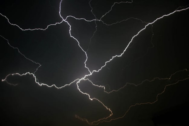 the sharp low rumble of thunder echoed in the city as lightning struck monday evening in karachi photo athar khan the sharp low rumble of thunder echoed in the city as lightning struck monday evening in karachi photo athar khan