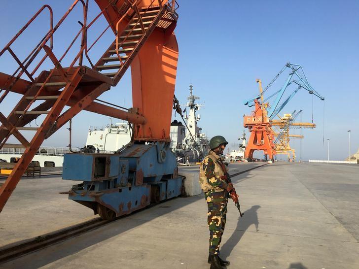 a member of pakistan navy is seen at the gwadar port photo reuters