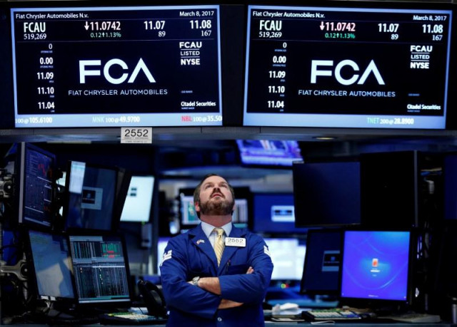a specialist trader works at the post where fiat chrysler automobiles is traded on the floor of the new york stock exchange nyse in new york us photo reuters a specialist trader works at the post where fiat chrysler automobiles is traded on the floor of the new york stock exchange nyse in new york us photo reuters