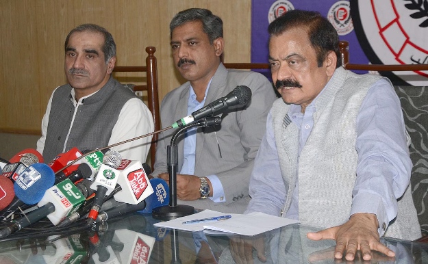 punjab law minister rana sanaullah flanked by advocate amjad pervaiz and railways minister khawaja saad rafique speaks at a press conference on wednesday august 23 2017