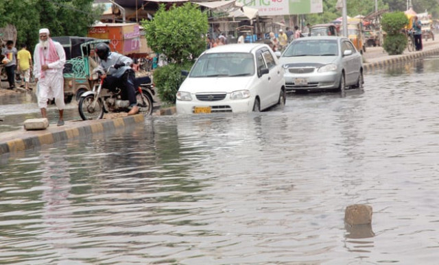 after the city received another thunderstorm on tuesday night various areas of the metropolis were again flooded with rainwater photos athar khan express after the city received another thunderstorm on tuesday night various areas of the metropolis were again flooded with rainwater photos athar khan express