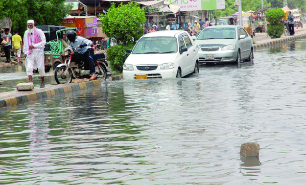 after the city received another thunderstorm on tuesday night various areas of the metropolis were again flooded with rainwater photos athar khan express